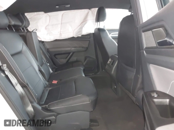 2021 Volkswagen Atlas SE z VIN 1V2NE2CA4MC201281, wystawiony jako IAAI lot #41242760 z przebiegiem 95 209 mil mil oraz . Historia ofert i sprzedaży dostępna na DreamBid. Obrazek 8.