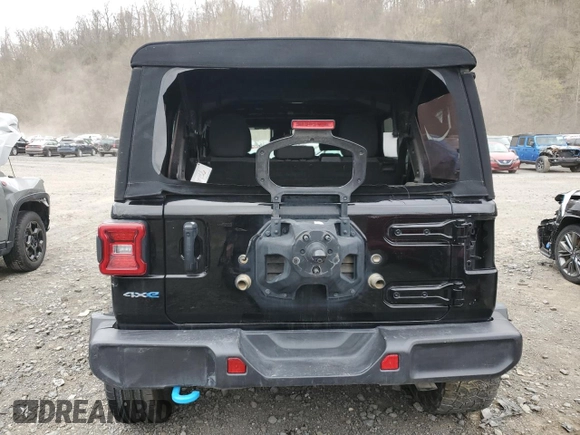 2024 Jeep Wrangler Sahara z VIN 1C4RJXP6XRW274744, wystawiony jako Copart lot #53604185 z przebiegiem 26 306 mil mil oraz Szkoda całkowita • Salvage title. Historia ofert i sprzedaży dostępna na DreamBid. Obrazek 6.