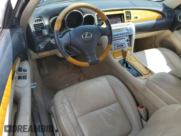 2003 Lexus SC with VIN JTHFN48YX30040974, listed as a Copart auction lot 71664234 with 99,257 mi miles and Salvage Title. Bid and sale history available at carsss.com. Image 8.
