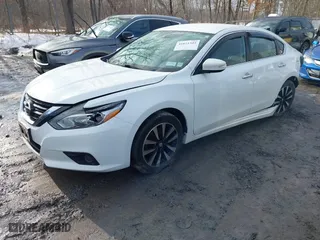 2018 Nissan Altima 2.5 SV with VIN 1N4AL3AP5JC170904, listed as a IAAI auction lot 41621502 with 115,674 mi miles. Bid and sale history available at carsss.com. Image 2.
