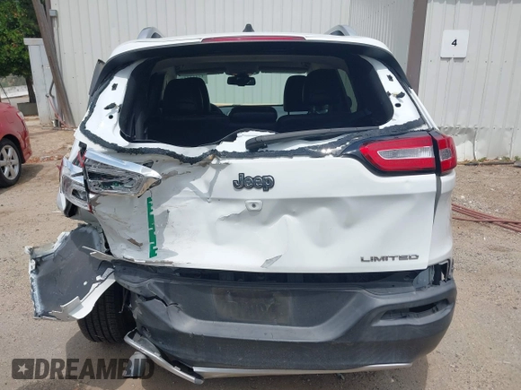2014 Jeep Cherokee Limited with VIN 1C4PJLDB2EW173127, listed as a IAAI auction lot 42413180 with 107,871 mi miles and . Bid and sale history available at DreamBid. Image 16.