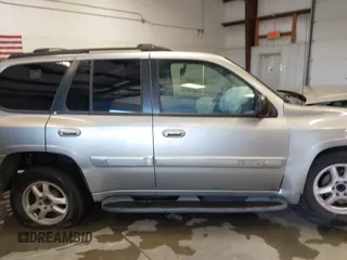 2003 GMC Envoy SLT z VIN 1GKDS13S932299354, wystawiony jako IAAI lot #41238557 z przebiegiem 251 535 mil mil oraz . Historia ofert i sprzedaży dostępna na DreamBid. Obrazek 14.