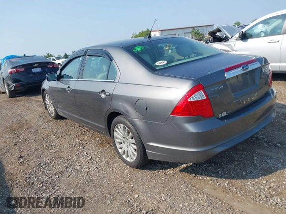 2011 Ford Fusion Hybrid with VIN 3FADP0L34BR253253, listed as a IAAI auction lot 42458290 with 137,110 mi miles and . Bid and sale history available at DreamBid. Image 3.
