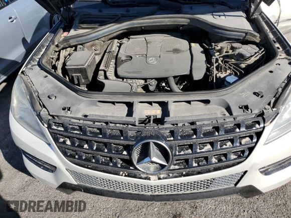 2015 Mercedes-Benz M ML 350 with VIN 4JGDA5JB1FA601587, listed as a Copart auction lot 46361785 with 140,942 mi miles and Salvage Title. Bid and sale history available at carsss.com. Image 12.
