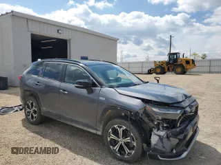 2022 Toyota RAV4 XSE with VIN JTMEB3FV4ND076096, listed as a Copart auction lot 58802695 with 141,543 mi miles and Salvage title. Bid and sale history available at DreamBid. Image 4.
