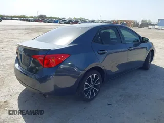 2019 Toyota Corolla L with VIN 5YFBURHE9KP910059, listed as a IAAI auction lot 41856905 with 104,096 mi miles and . Bid and sale history available at DreamBid. Image 4.