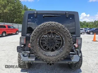 2013 Jeep Wrangler Unlimited Sport z VIN 1C4BJWDG3DL658674, wystawiony jako Copart lot #54851685 z przebiegiem 113 852 mil mil oraz Czysty tytuł • Clean title. Historia ofert i sprzedaży dostępna na DreamBid. Obrazek 6.