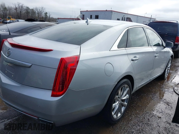 2013 Cadillac XTS Premium with VIN 2G61S5S36D9111444, listed as a IAAI auction lot 41558500 with 101,223 mi miles. Bid and sale history available at carsss.com. Image 4.