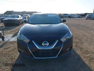 2016 Nissan Maxima SL with VIN 1N4AA6AP6GC902182, listed as a IAAI auction lot 41963457 with 63,912 mi miles and . Bid and sale history available at DreamBid. Image 13.