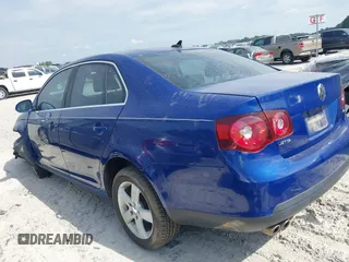 2009 Volkswagen Jetta SE z VIN 3VWRZ71K99M159242, wystawiony jako IAAI lot #42200917 z przebiegiem 226 285 mil mil oraz . Historia ofert i sprzedaży dostępna na DreamBid. Obrazek 15.