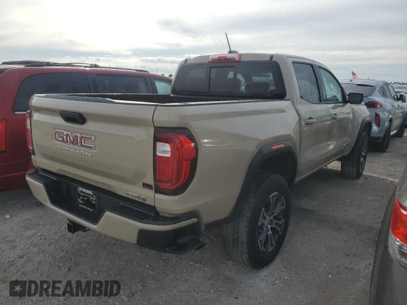 2023 GMC Canyon 4WD AT4 with VIN 1GTP6DEK3P1151112, listed as a Copart auction lot 77150454 with 5,573 mi miles and Non Repairable. Bid and sale history available at carsss.com. Image 3.