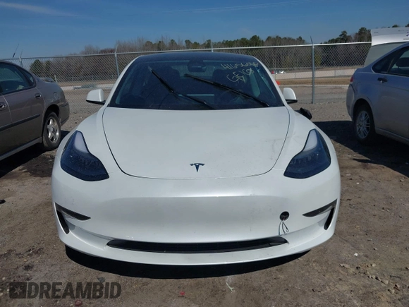 2023 Tesla Model 3 Long Range with VIN 5YJ3E1EB1PF393565, listed as a IAAI auction lot 41656060 with 16,236 mi miles and . Bid and sale history available at DreamBid. Image 12.