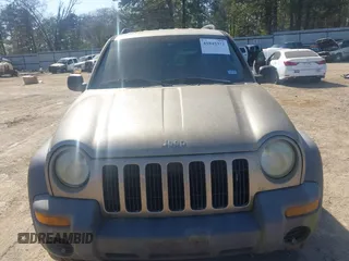 2004 Jeep Liberty Sport with VIN 1J4GK48K84W257152, listed as a IAAI auction lot 41845371 with 173,957 mi miles and . Bid and sale history available at DreamBid. Image 6.