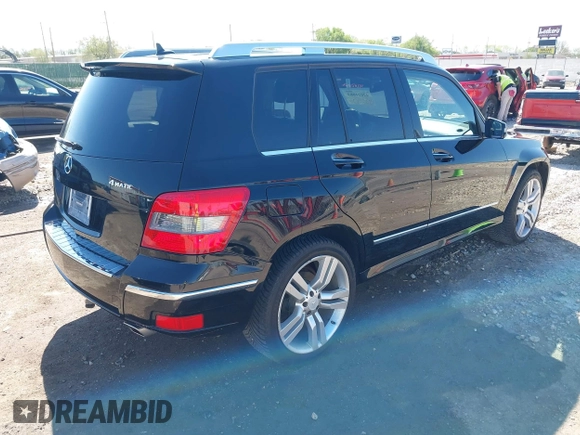 2012 Mercedes-Benz GLK GLK 350 with VIN WDCGG8HB6CF841198, listed as a IAAI auction lot 42021083 with 162,930 mi miles. Bid and sale history available at carsss.com. Image 4.