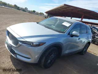 2020 Mazda CX-5 Touring with VIN JM3KFACM0L0772635, listed as a IAAI auction lot 41635115 with 120,285 mi miles. Bid and sale history available at carsss.com. Image 14.