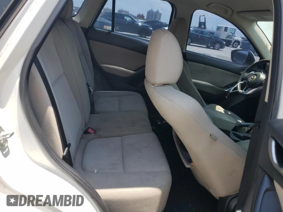 2013 Mazda CX-5 Sport z VIN JM3KE2BE6D0160556, wystawiony jako Copart lot #59605295 z przebiegiem 195 468 mil mil oraz Czysty tytuł • Clean title. Historia ofert i sprzedaży dostępna na DreamBid. Obrazek 11.