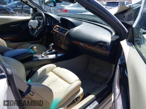 2009 BMW 6 Series 650i z VIN WBAEB53579CX64649, wystawiony jako IAAI lot #41937705 z przebiegiem 136 164 mil mil oraz . Historia ofert i sprzedaży dostępna na DreamBid. Obrazek 5.