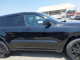 2019 Jeep Grand Cherokee Laredo z VIN 1C4RJEAG7KC858239, wystawiony jako IAAI lot #42587403 z przebiegiem 41 879 mil mil oraz . Historia ofert i sprzedaży dostępna na DreamBid. Obrazek 14.