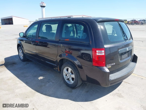 2010 Dodge Grand Caravan SE with VIN 2D4RN4DE6AR297369, listed as a IAAI auction lot 42036741 with 200,298 mi miles. Bid and sale history available at carsss.com. Image 3.
