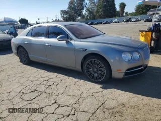 2014 Bentley Flying Spur z VIN SCBEC9ZA7EC090575, wystawiony jako Copart lot #57110315 z przebiegiem 19 083 mil mil oraz Szkoda całkowita • Salvage title. Historia ofert i sprzedaży dostępna na DreamBid. Obrazek 4.