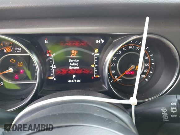 2023 Jeep Wrangler Willys z VIN 1C4HJXDG9PW545749, wystawiony jako IAAI lot #42307373 z przebiegiem 44 176 mil mil oraz . Historia ofert i sprzedaży dostępna na DreamBid. Obrazek 7.