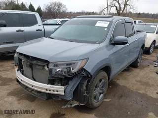 2023 Honda Ridgeline RTL-E with VIN 5FPYK3F70PB030718, listed as a IAAI auction lot 41667869 with 18,768 mi miles. Bid and sale history available at carsss.com. Image 18.