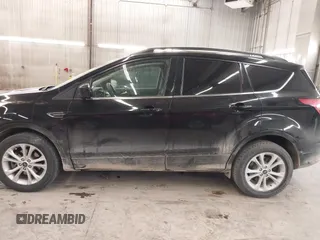 2018 Ford Escape SE z VIN 1FMCU9GD0JUC25636, wystawiony jako IAAI lot #40996760 z przebiegiem 70 097 mil mil oraz . Historia ofert i sprzedaży dostępna na DreamBid. Obrazek 15.