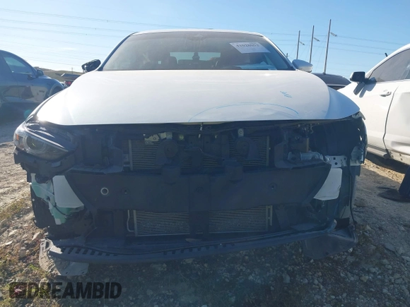 2022 Mazda 3 Premium with VIN 3MZBPADL8NM312356, listed as a IAAI auction lot 41028052 with 30,370 mi miles and . Bid and sale history available at DreamBid. Image 6.