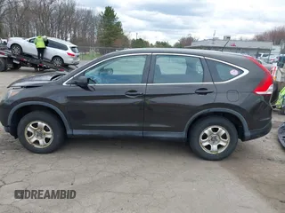 2014 Honda CR-V LX with VIN 2HKRM4H33EH661582, listed as a IAAI auction lot 42002466 with 191,073 mi miles. Bid and sale history available at carsss.com. Image 15.