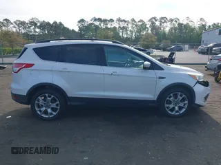 2013 Ford Escape SEL with VIN 1FMCU9H99DUA97959, listed as a IAAI auction lot 41879967 with 149,456 mi miles. Bid and sale history available at carsss.com. Image 13.