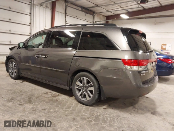 2016 Honda Odyssey Touring Elite with VIN 5FNRL5H92GB045824, listed as a IAAI auction lot 41872220 with 120,557 mi miles. Bid and sale history available at carsss.com. Image 3.