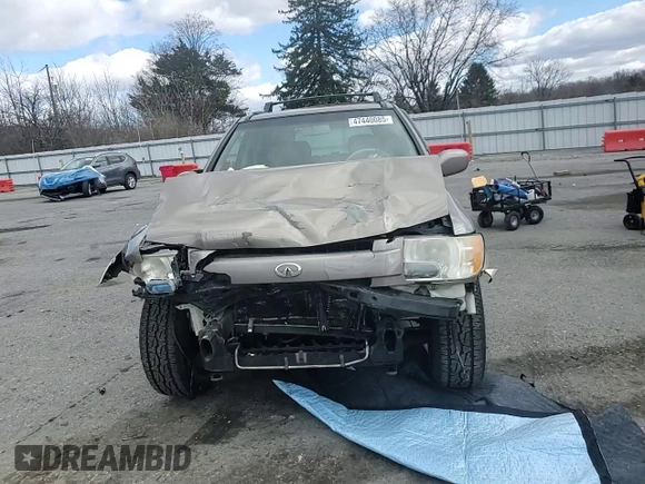 2001 Infiniti QX4 Luxury z VIN JNRDR07Y41W108932, wystawiony jako Copart lot #47440085 z przebiegiem 131 045 mil mil oraz Szkoda całkowita • Salvage title. Historia ofert i sprzedaży dostępna na DreamBid. Obrazek 12.