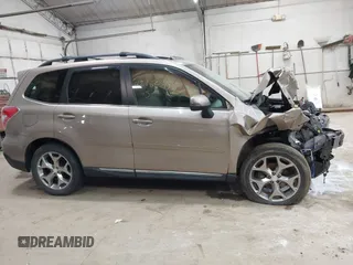 2015 Subaru Forester Touring z VIN JF2SJAUC4FH586763, wystawiony jako IAAI lot #42160456 z przebiegiem 59 412 mil mil oraz . Historia ofert i sprzedaży dostępna na DreamBid. Obrazek 13.