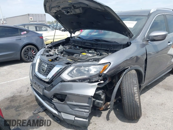 2018 Nissan Rogue S with VIN KNMAT2MT6JP615219, listed as a IAAI auction lot 42038992 with 64,334 mi miles and . Bid and sale history available at carsss.com. Image 6.