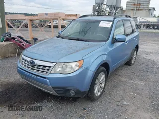 2011 Subaru Forester X Limited with VIN JF2SHAECXBH704853, listed as a IAAI auction lot 42500091 with 156,140 mi miles and . Bid and sale history available at DreamBid. Image 2.