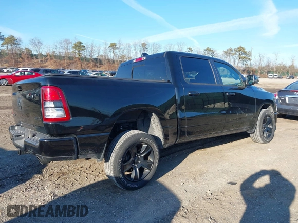 2023 Ram 1500 Big Horn with VIN 1C6SRFFT1PN660751, listed as a IAAI auction lot 41692496 with 30,215 mi miles and . Bid and sale history available at DreamBid. Image 4.