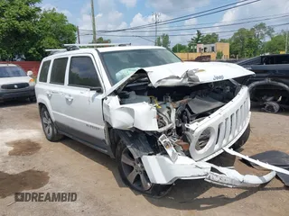 2016 Jeep Patriot Latitude with VIN 1C4NJRFB5GD674048, listed as a IAAI auction lot 42502023 with 128,127 mi miles and . Bid and sale history available at DreamBid. Image 1.
