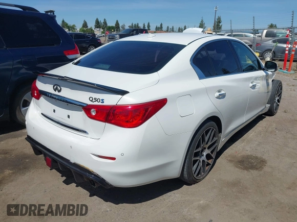2014 Infiniti Q50 Hybrid Premium z VIN JN1AV7AP3EM690226, wystawiony jako IAAI lot #42259111 z przebiegiem 140 424 mil mil oraz . Historia ofert i sprzedaży dostępna na DreamBid. Obrazek 4.