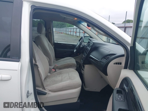 2012 Dodge Grand Caravan SE with VIN 2C4RDGBG8CR115003, listed as a IAAI auction lot 42217153 with 196,833 mi miles and . Bid and sale history available at DreamBid. Image 5.
