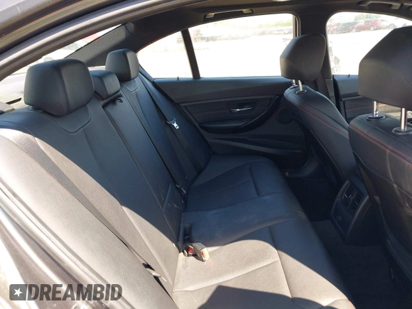 2012 BMW 3 Series 335i with VIN WBA3A9C5XCF077642, listed as a IAAI auction lot 42385611 with 119,251 mi miles and . Bid and sale history available at DreamBid. Image 8.