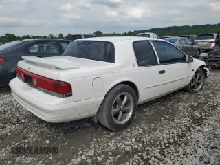 1995 Mercury Cougar z VIN 1MELM62W1SH624477, wystawiony jako Copart lot #56720625 z przebiegiem 156 034 mil mil oraz Szkoda całkowita • Salvage title. Historia ofert i sprzedaży dostępna na DreamBid. Obrazek 3.