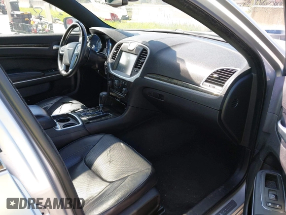 2012 Chrysler 300 with VIN 2C3CCAET2CH207796, listed as a IAAI auction lot 42029639 with 142,929 mi miles. Bid and sale history available at carsss.com. Image 5.