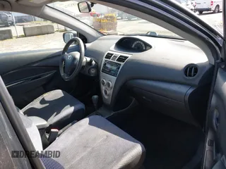 2007 Toyota Yaris with VIN JTDBT923371009887, listed as a IAAI auction lot 41852074 with 147,039 mi miles. Bid and sale history available at carsss.com. Image 5.