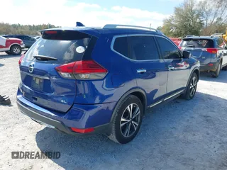 2017 Nissan Rogue SL with VIN JN8AT2MT6HW139347, listed as a IAAI auction lot 41771728 with 215,809 mi miles and . Bid and sale history available at DreamBid. Image 4.