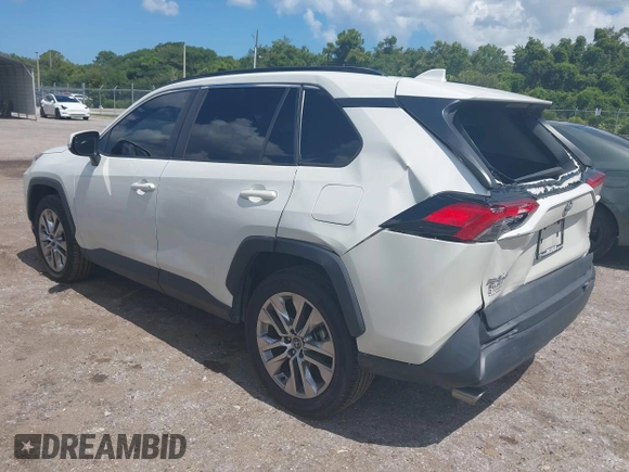 2021 Toyota RAV4 XLE Premium with VIN 2T3C1RFV0MW107651, listed as a IAAI auction lot 42558254 with 68,286 mi miles and . Bid and sale history available at DreamBid. Image 3.