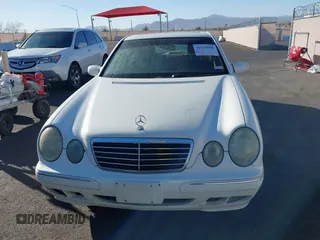2002 Mercedes-Benz E-Class with VIN WDBJF65J22B455901, listed as a IAAI auction lot 41679008 with 153,854 mi miles. Bid and sale history available at carsss.com. Image 12.