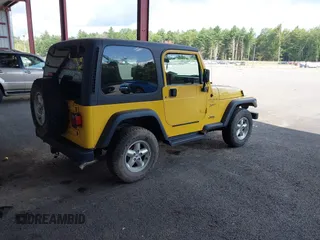 2001 Jeep Wrangler Sport with VIN 1J4FA49S81P370778, listed as a IAAI auction lot 42715015 with 123,259 mi miles and . Bid and sale history available at DreamBid. Image 4.