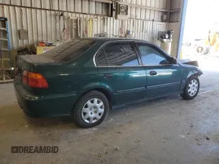 2000 Honda Civic LX with VIN JHMEJ6679YS005805, listed as a Copart auction lot 49810095 with 224,984 mi miles and Salvage Title. Bid and sale history available at DreamBid. Image 3.