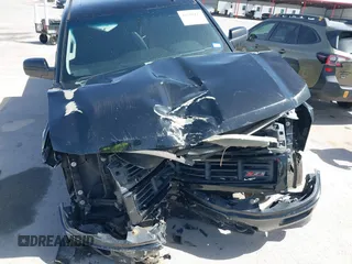 2014 Chevrolet Silverado 1500 LT with VIN 3GCUKREH8EG210945, listed as a IAAI auction lot 41718435 with 106,320 mi miles and . Bid and sale history available at DreamBid. Image 6.