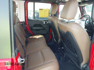 2021 Jeep Wrangler Unlimited Rubicon with VIN 1C4HJXFG2MW575541, listed as a IAAI auction lot 42247475 with 92,353 mi miles and . Bid and sale history available at DreamBid. Image 8.